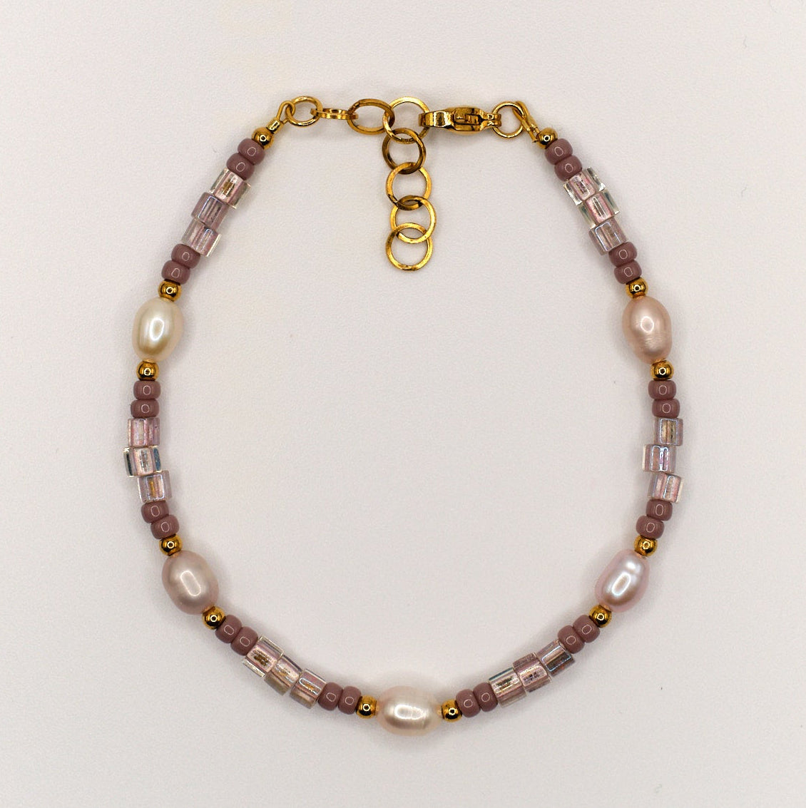 Armband Lia - Süßwasserpelen - Edelstahl - Lila/Gold